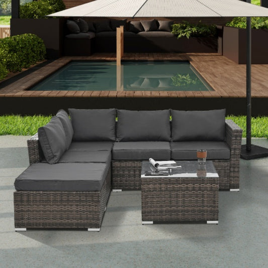 Patio Furniture 4-Piece Set – Seasonal PE Wicker Outdoor Sofa with Tempered Glass Coffee Table & Ottoman (Brown)